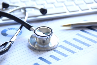 scientific report with stethoscope.
