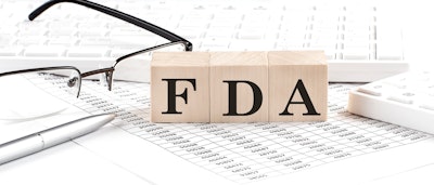 Image of glasses, keyboard and paper with FDA on block letters.