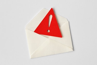 Graphic of envelope with red warning triangle coming out of it.