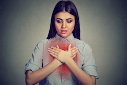 Picture of woman cross arms over reddened lungs.