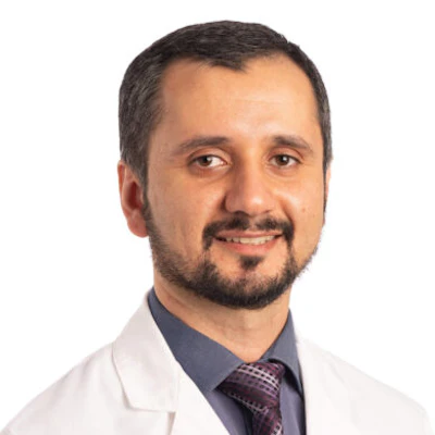 This is a professional headshot of the lead researcher in the article, Erhan Ararat, MD.