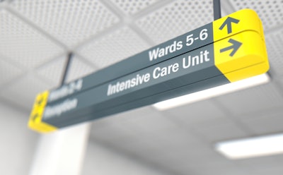Image of hospital sign pointing toward the ICU.