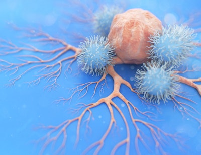 Image of natural killer cells attacking a cancer cell in the lungs.