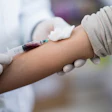 This is an image of a person getting a blood draw at a clinic.