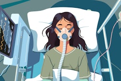 Patient on ventilator life-support wearing oxygen mask lying on hospital bed. Intensive care unit COVID disease lung treatment.