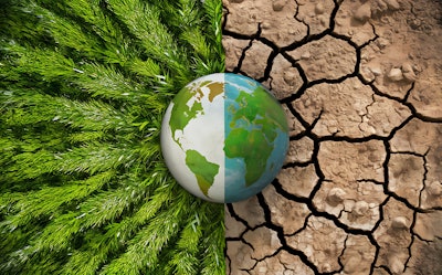 This is a conceptual image of Earth with one half showing lush greenery and the other half showing dry, cracked soil, representing environmental contrast.