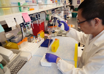 A researcher at work inside the laboratory of Ankit Bharat, MBSS.