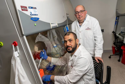 Yassine Sassi (standing), associate professor at the Fralin Biomedical Research Institute at VTC, and Aymen Halouani, first author of the study.