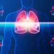 Digital medical visualization of glowing lungs in human body with health monitoring data panels and vital signs displays